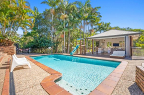 Paradise Retreat Resort Home with Waterfall & Pool on 2000m2